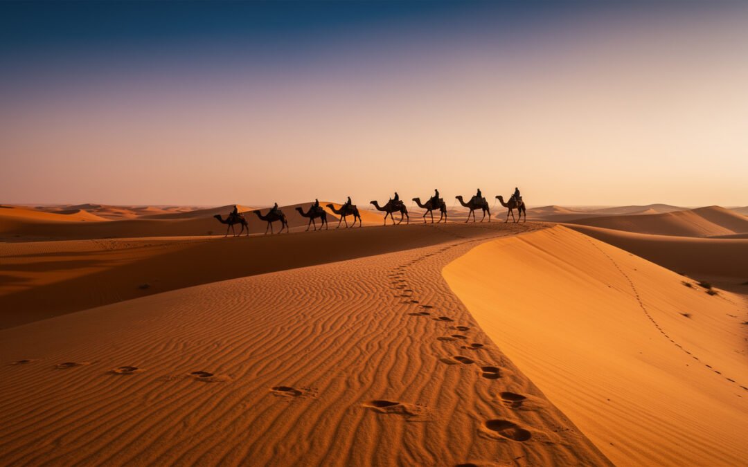 Désert de Merzouga Maroc – grandes dunes de sable doré du Sahara au lever du soleil, caravane de chameaux en silhouette, lumière et ombres spectaculaires, Erg Chebbi